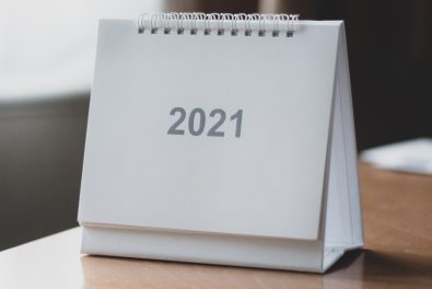 image of desk calendar with displayed page that says "2021"
